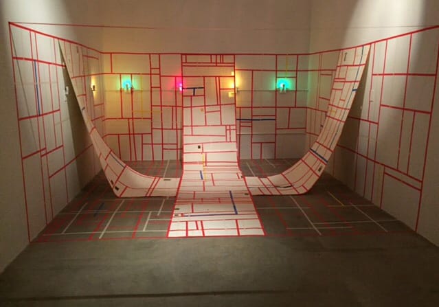 Student artwork by Adrienne Cole, a large room installation with different rectangle shapes outlined