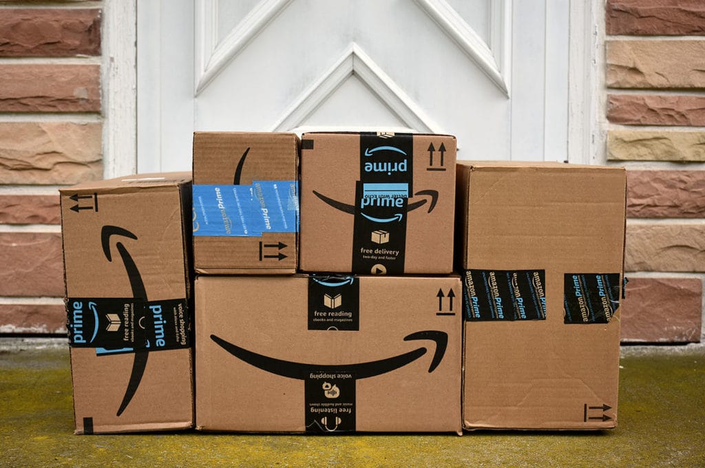 Amazon boxes at a doorstep
