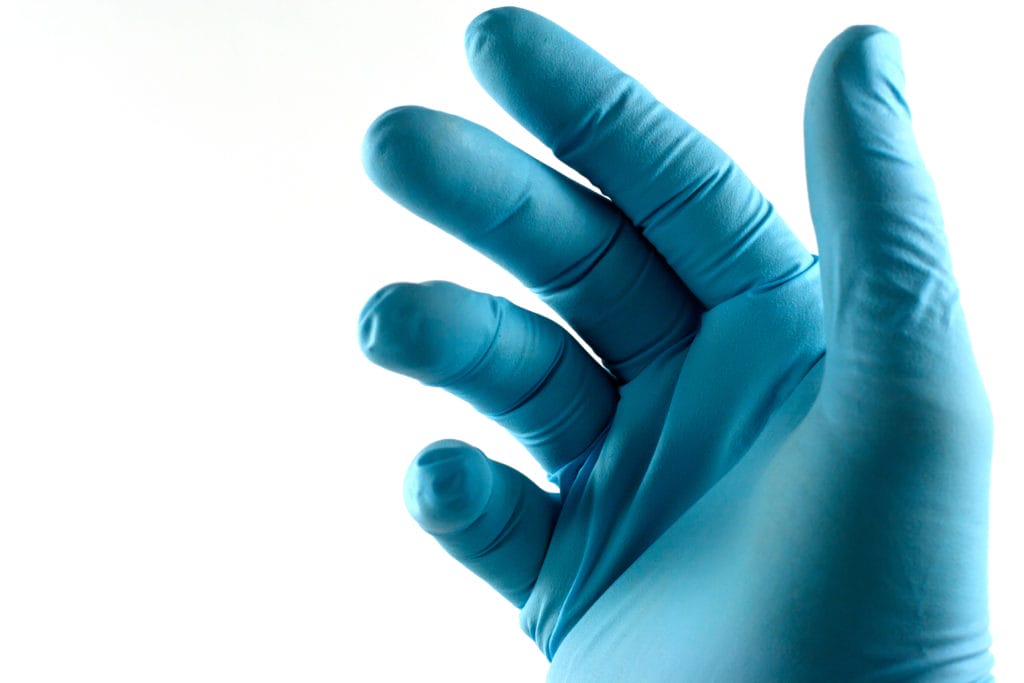 Photo of a surgeon's gloved hand