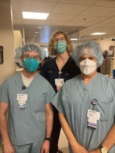 Dbos Student Alexander Marshburn, HCA Resident, and Professor Jason Siegel standing in a hospital