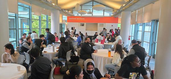 People gathered at the 2025 CGU Hackathon