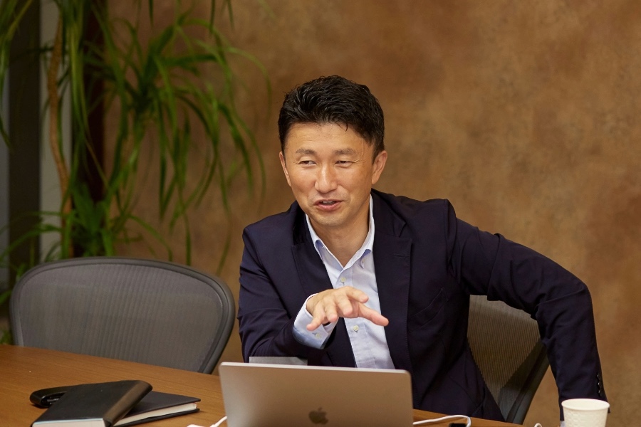 Katsutoshi Fujita presenting